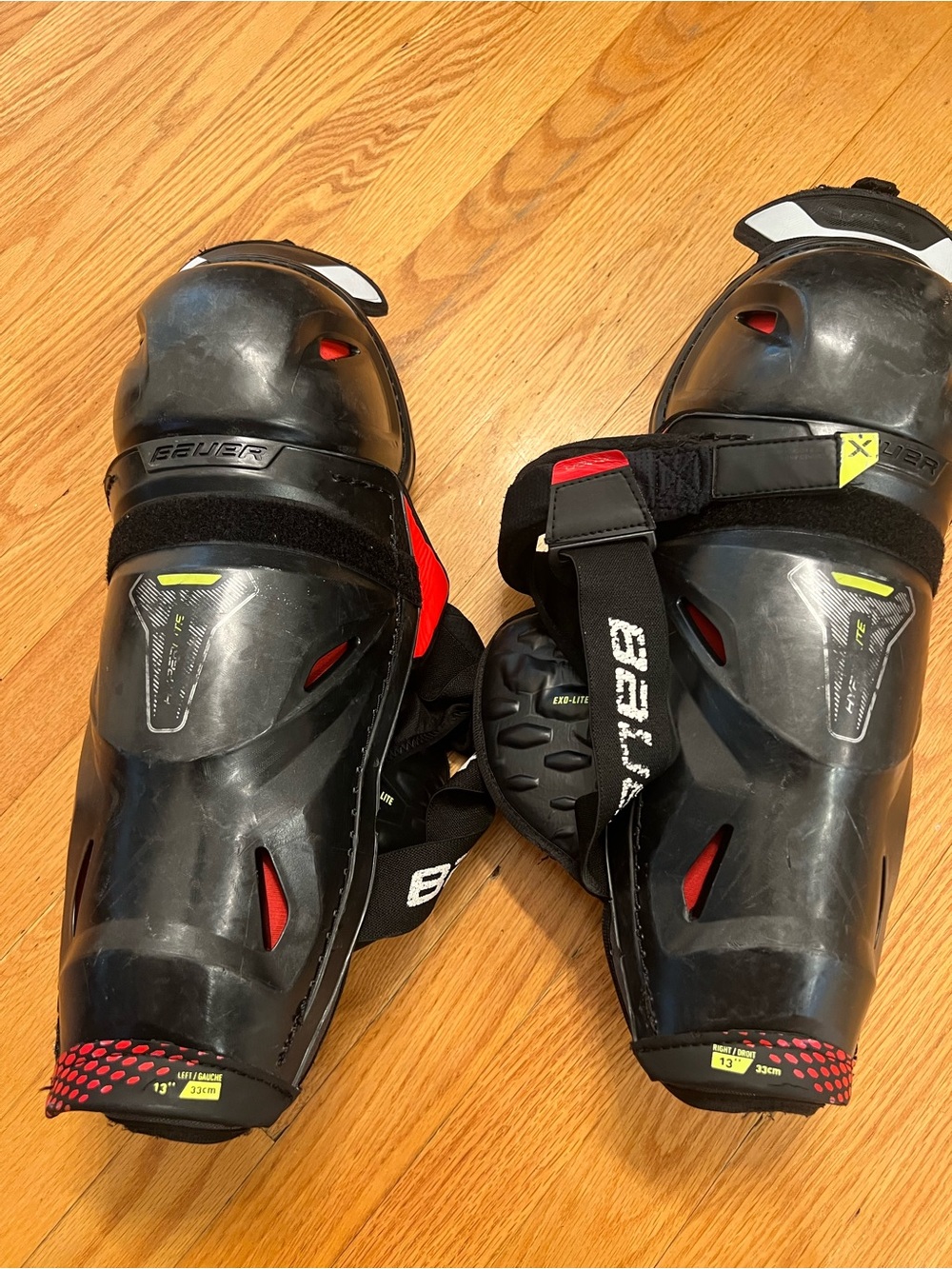 Bauer hyperlite 13” Black Red hockey Shin Guards with Neon Yellow Accents